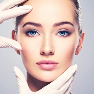 Face,Skin,Check,Before,Plastic,Surgery.,Beautician,Touching,Woman,Face. Face,Skin,Check,Before,Plastic,Surgery.,Beautician,Touching,Woman,Face.